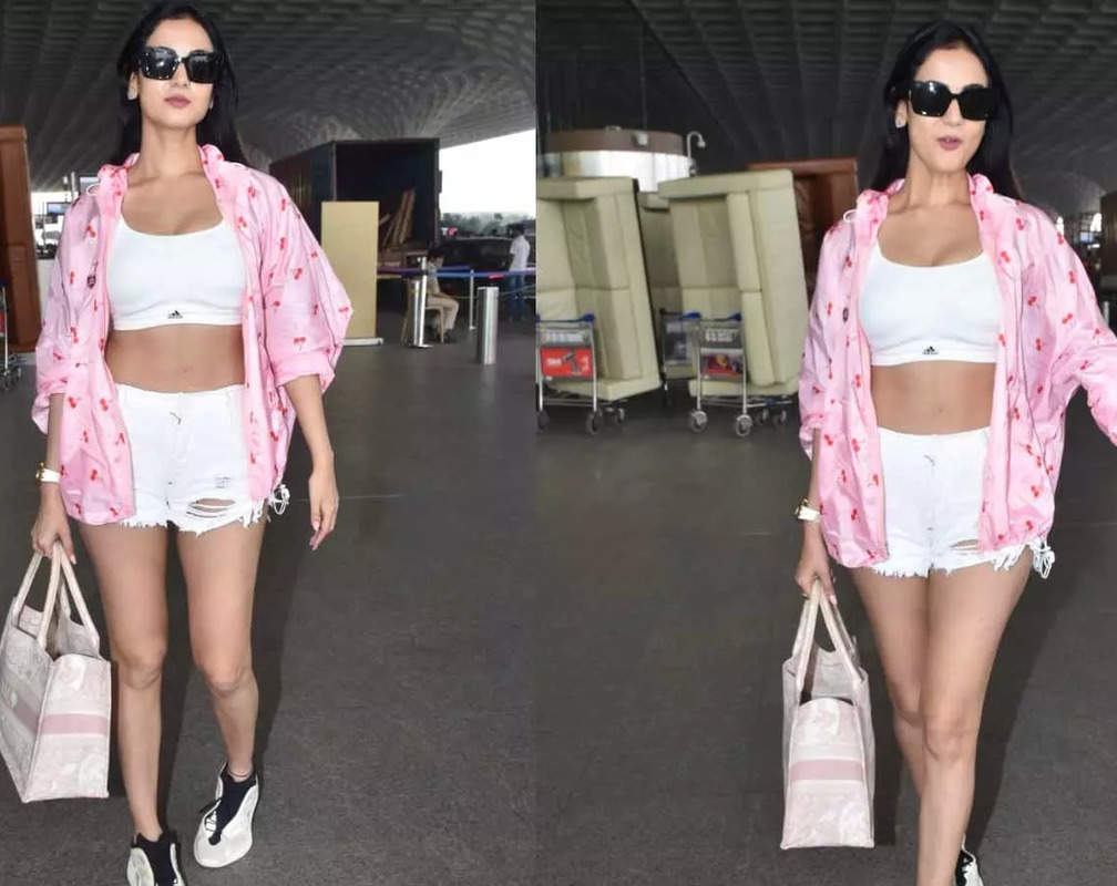 
35-year-old Sonal Chauhan rocks casual airport look in a white sports bra and shorts
