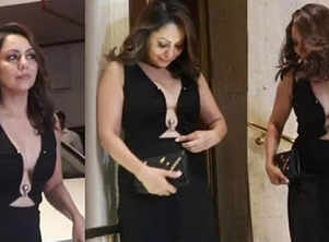 SRK's wife Gauri gets uncomfortable in a tight dress