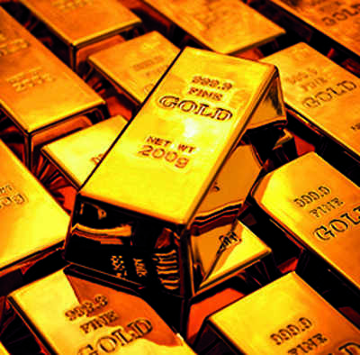 Gold stalls as traders brace for Fed verdict - Times of India