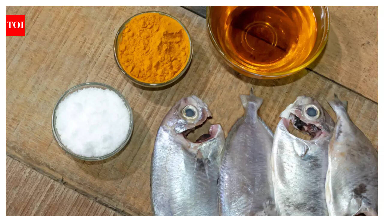 Why is fish marinated in salt and turmeric?