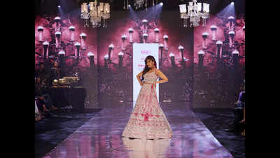 Chitrangada Singh turns showstopper in a rani pink lehenga at the Hyderabad Times Fashion Week