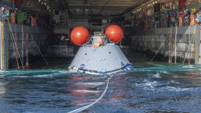 Nasa's Orion capsule splashes down in Pacific after uncrewed Artemis moon voyage