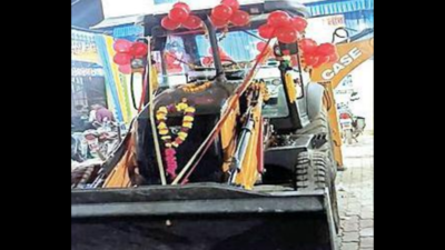 In UP's Hamirpur, bulldozer gifted to groom by in-laws