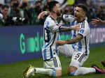 Argentina's Lionel Messi, left, and Argentina's Leandro Paredes celebrate after ...