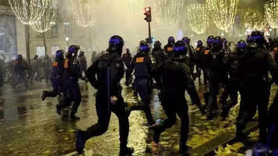 French police use tear gas against fans on Champs-Elysees in Paris: Report