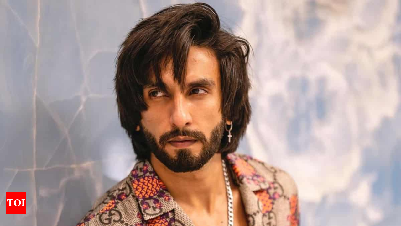 A deeper look at Ranveer Singh's statement style and love for logos | Vogue  India