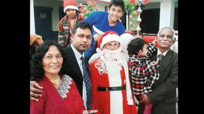Ho ho ho: Real-life Santas spread Christmas cheer among kids in