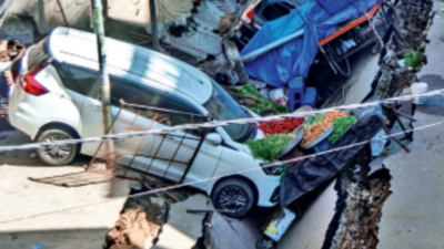 In Hyderabad, Goshamahal totters, road caves in, cars in sinkhole