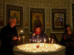 Believers attend a service on the eve of Christmas in Kyiv