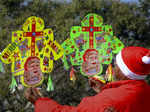 Amritsar: Kite maker Jagmohan Kanojia wearing Santa Claus cap displays kites on ...