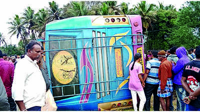 One dies, 10 injured as bus falls into pit