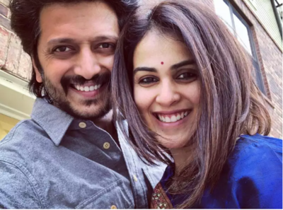 Power couple Riteish Deshmukh and Genelia D'Souza twin in red at Ved screening, see video