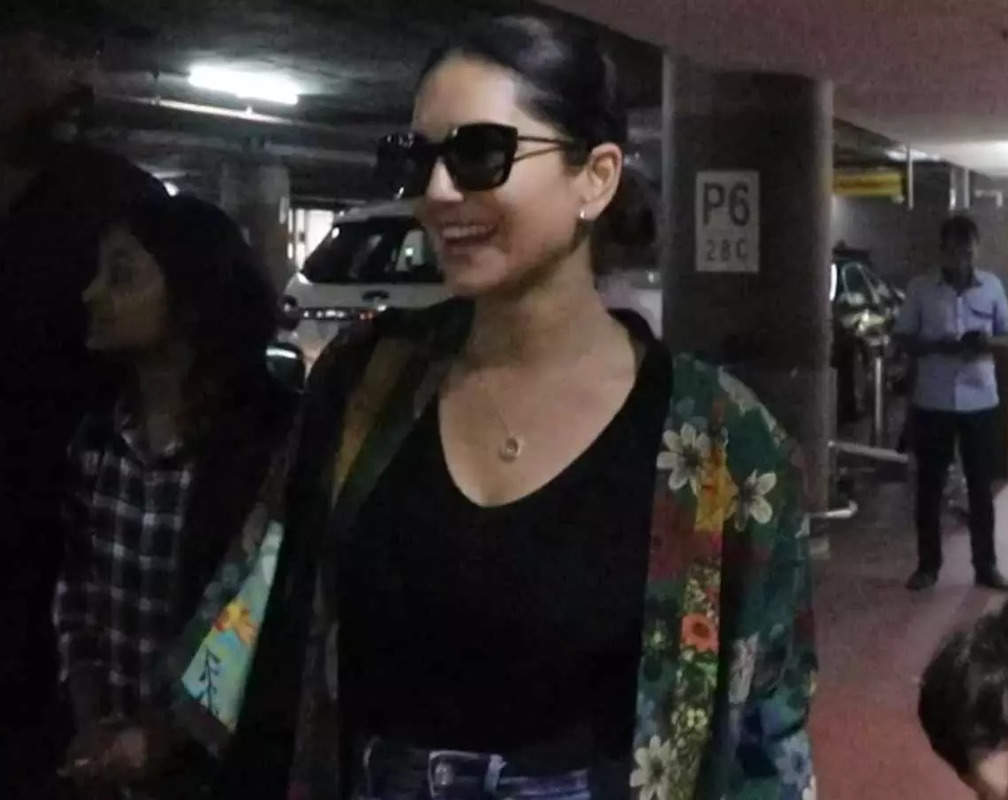 
Sunny Leone looks stunning in her green printed shrug paired with jeans, gets spotted with husband and kids

