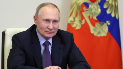 Putin oversees launch of new warships, submarines