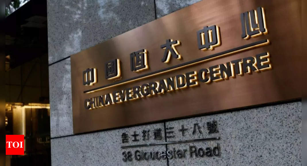 China Evergrande Debt: Troubled China Evergrande pledges to repay debts in 2023 | International Business News – Times of India