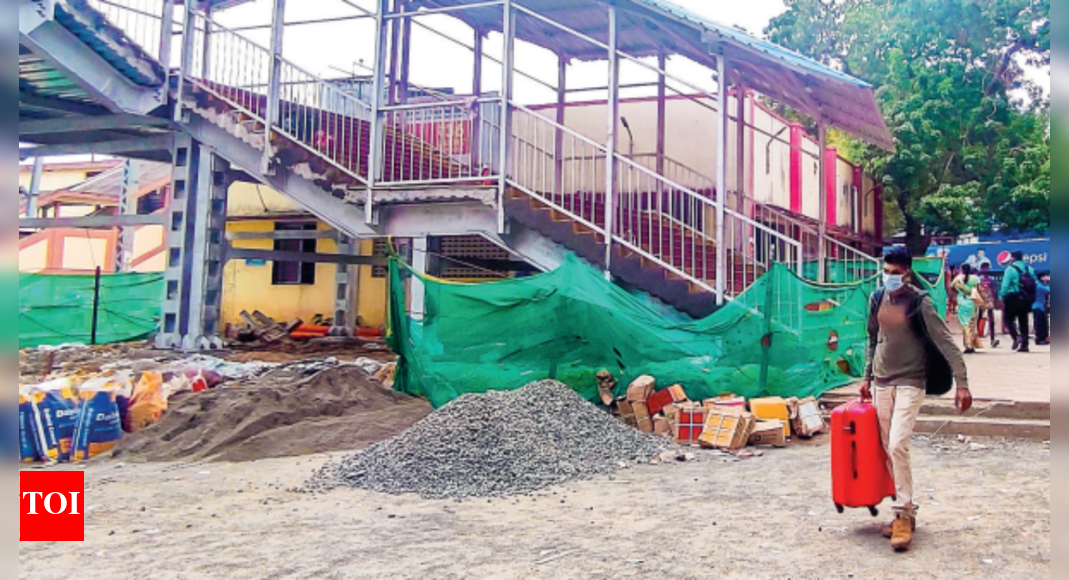 Commuters Chennai commuters seek a connection between two parallel