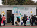 People queue at a community vaccination centre, ahead of an expected border reopening with China, during the coronavirus disease (COVID-19) pandemic in Hong Kong