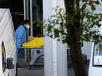 Staff member pushes a cart carrying a body bag at a funeral home, as COVID-19 outbreaks continue in Shanghai