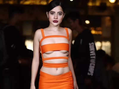 Urfi Javed grooves to 'Besharam Rang' song in a saffron cut-out dress; netizens feel she is only doing it for 'attention'