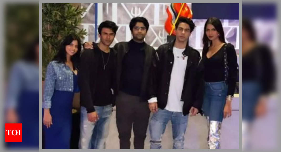 Aryan poses with sister Suhana and friends
