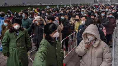 'Life is moving forward': China declares new Covid phase