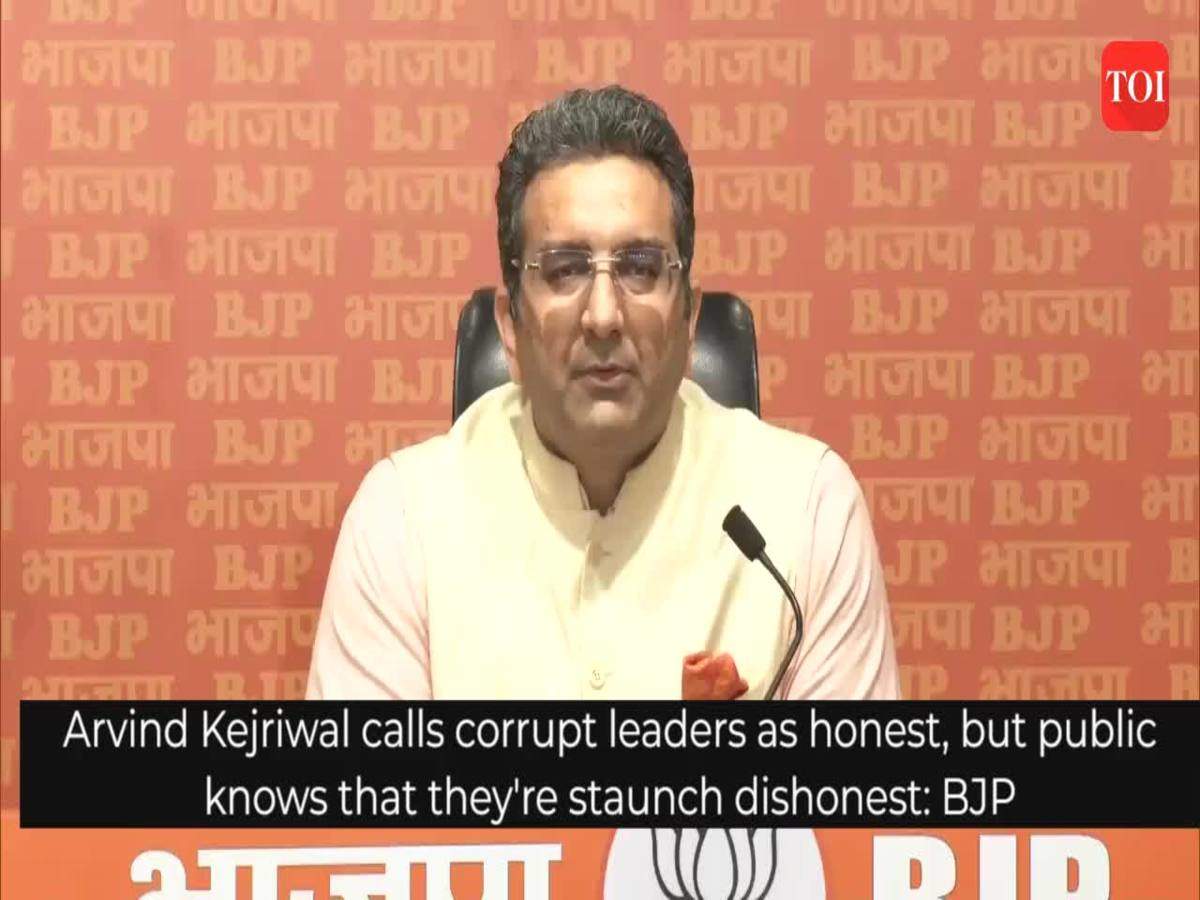 Kejriwal stands by corrupt leaders and calls them 'staunch honest': BJP |  News - Times of India Videos