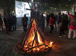 New Delhi: People celebrate Lohri festival at Delhi Haat INA in New Delhi on Friday January 13, 2023. (Photo: Wasim Sarvar/IANS)