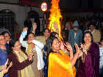 Ranchi: Women perform a traditional dance around a bonfire during 'Lohri' festiv...