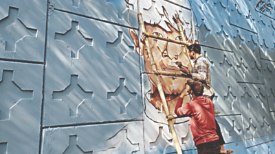 Painters deck up Bhubaneswar with hockey artwork