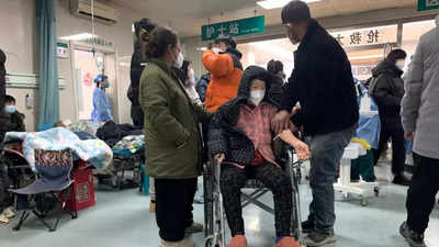 WHO urges China to share more data on Covid outbreak after Beijing reports nearly 60,000 deaths in a month