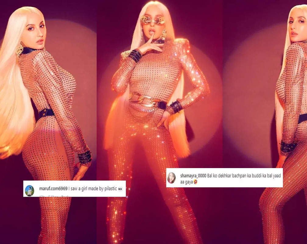 
Amid dating rumours with Aaryan Khan, Nora Fatehi drops pics wearing body-hugging suit inspired by Lady Gaga and Cardi B with blonde wig, trolls say 'girl made of plastic'
