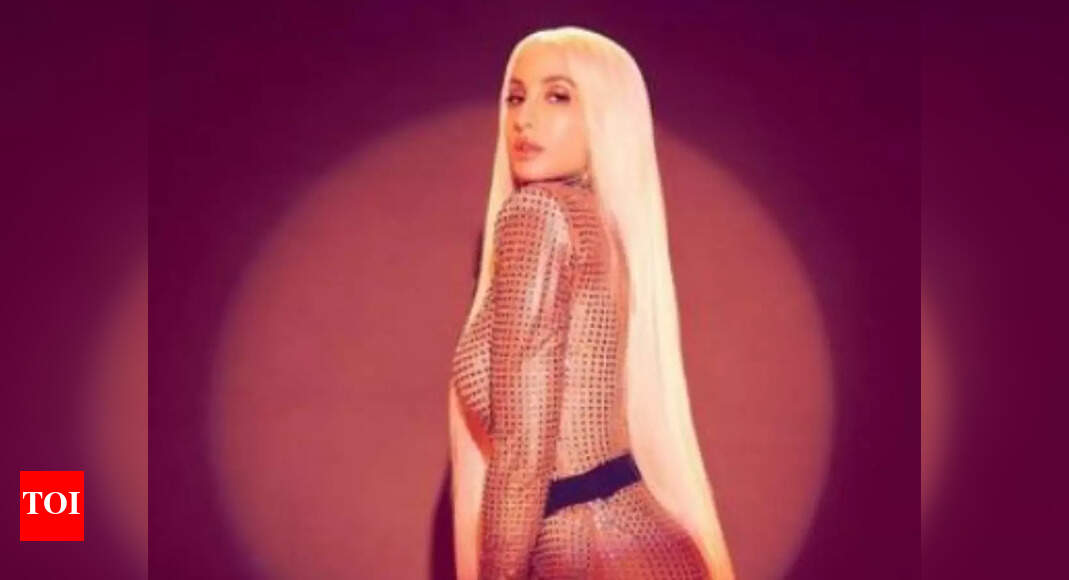 Nora Fatehi gets brutally trolled as she drops pictures in a shimmer body suit inspired by Lady Gaga and Cardi B – Deets inside | Hindi Movie News