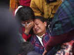 A woman wails as she waits to receive the body of a relative, victim of a plane ...