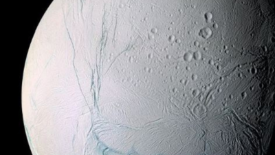 'Deep ocean below a frozen surface': Nasa releases stunning images of Saturn's moon Enceladus