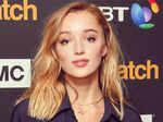 Phoebe Dynevor raises the oomph factor as she poses for the paparazzi.