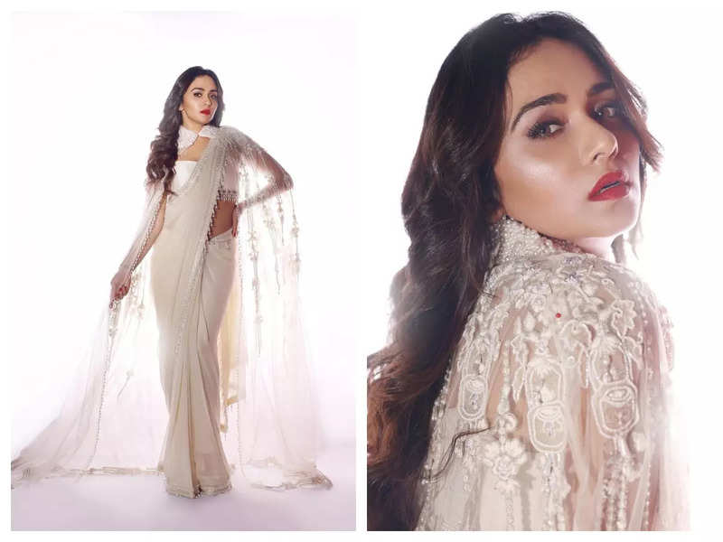 Amruta Khanvilkar looks like an absolute delight as she strikes a pose in a white saree; See pics