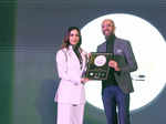 Maneck Malhotra felicitated by Malaika Arora