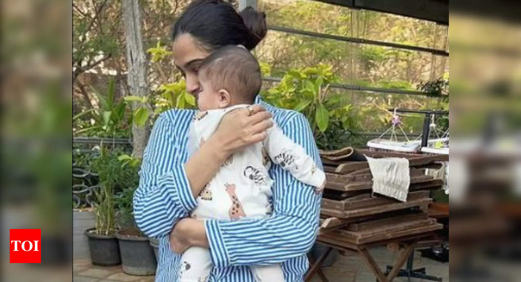 Sonam Kapoor hugs Vayu in a new unseen picture dropped by Anand Ahuja, says he misses them; netizens react! – Times of India