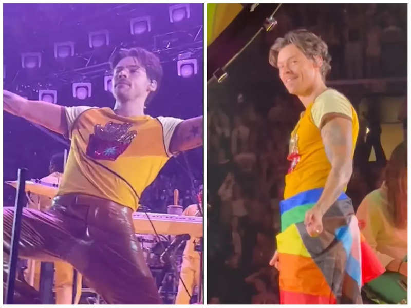 Harry Styles suffers wardrobe malfunction as pant rips on-stage; singer continues show after tying pride flag aground waist