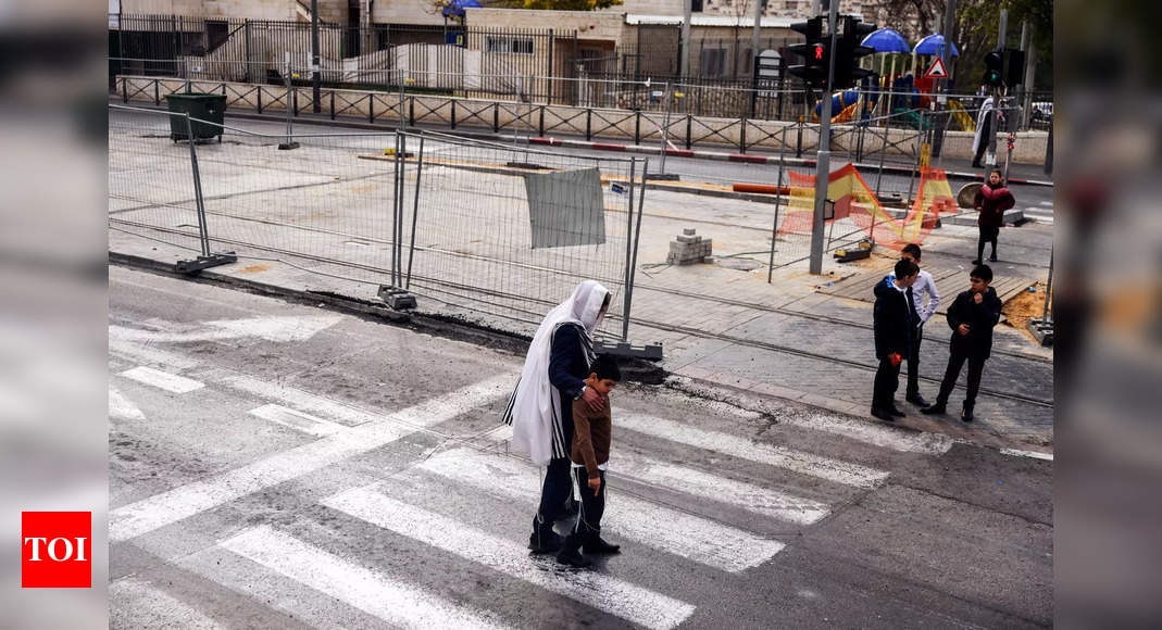 New gun attack in east Jerusalem after synagogue shooting – Times of India