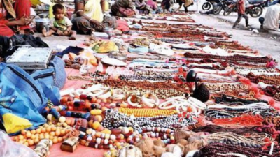 Nomads selling herbs & replica of rare items in Allahabad's Magh Mela area