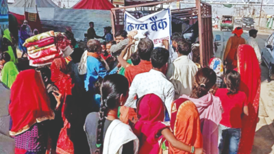 Clothes distributed to sanitary workers at Magh Mela campus