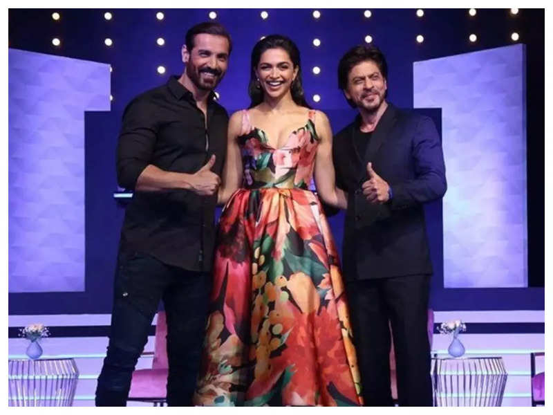 Shah Rukh Khan says they are playing characters to make audiences happy; calls Deepika Padukone, John Abraham and himself, 'Amar Akbar Anthony'