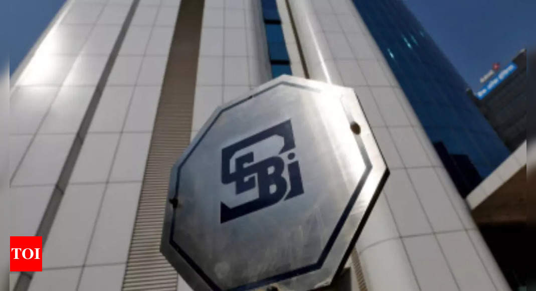 Sebi meets ratings firms over Adani companies – Times of India