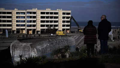 France destroys seaside flats threatened by coastal erosion