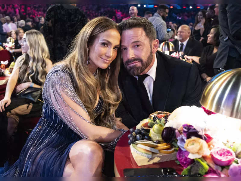 Fans go crazy spotting a bored Ben Affleck sitting next to an impatient-looking Jennifer Lopez at the Grammys
