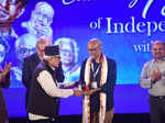 Mohan Agashe felicitating  A Sreekar Prasad