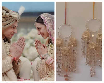 Sidharth Malhotra keeps it simple with his gold wedding band; Kiara Advani's uncut diamond ring and designer kaleeeras steal the limelight - See photo