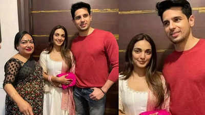 Sidharth Malhotra and Kiara Advani opt for simple looks for their Delhi wedding reception; the newlywed couple to host grand reception in Mumbai for Bollywood friends