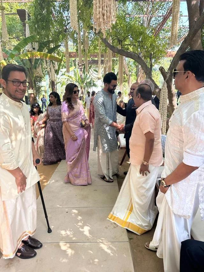 Aamir Khan uses walking stick at a celebrity wedding, pictures leave fans  worried | Hindi Movie News - Times of India